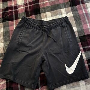 Nike Men’s Black Athletic Shorts with White Swoosh Accent